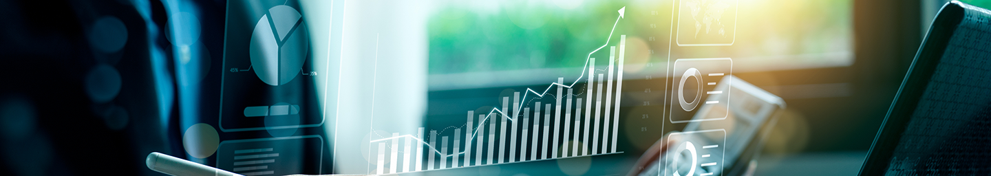 Growth image for detail page, showing business person sitting at desk viewing imagery showing upward movement